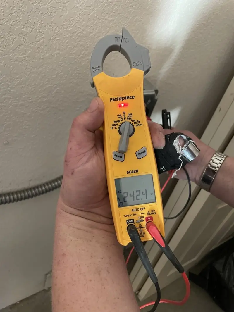 Voltage testing with clamp meter during Generator Installation in Hollidaysburg